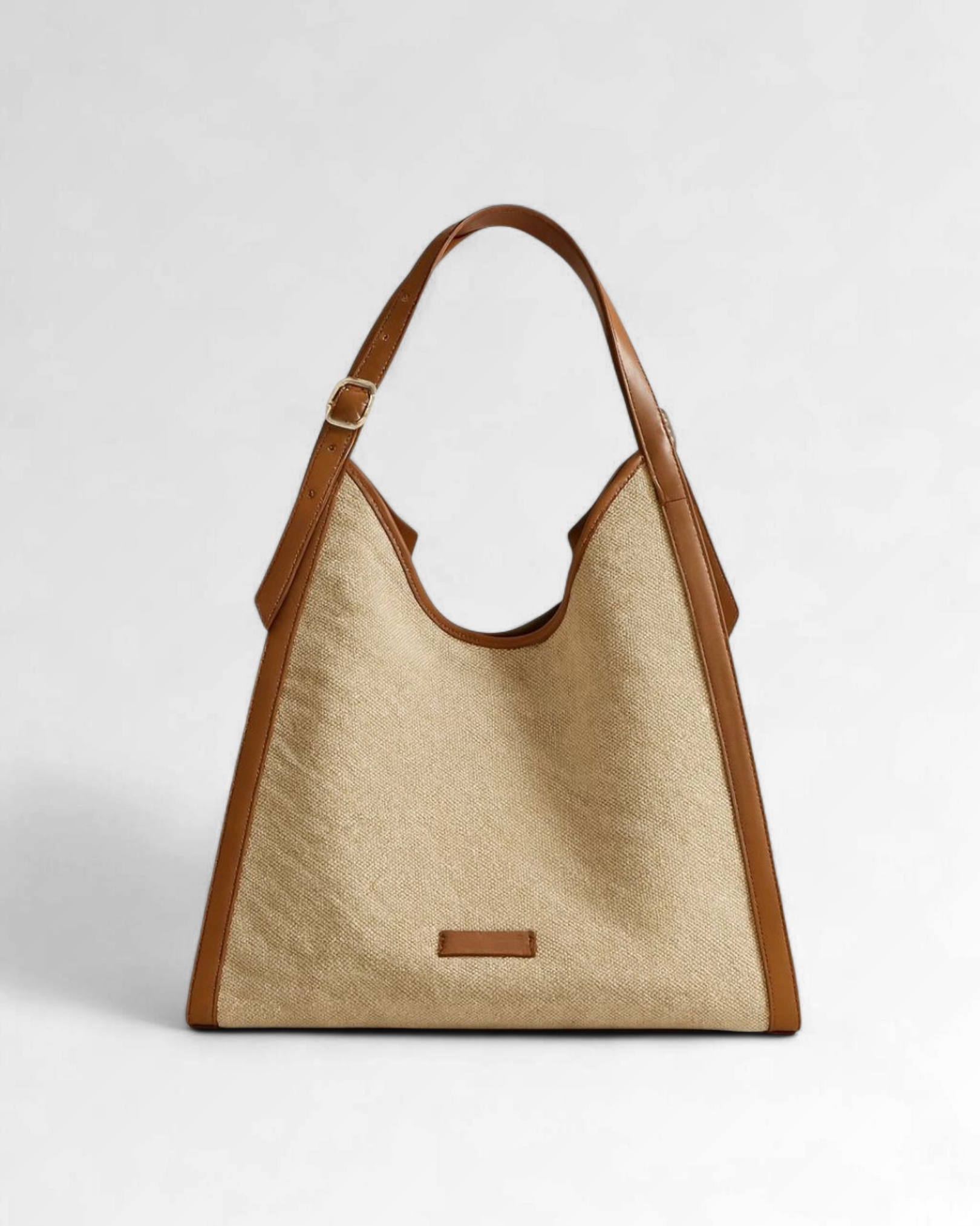 The Leather-Trimmed Canvas Tote